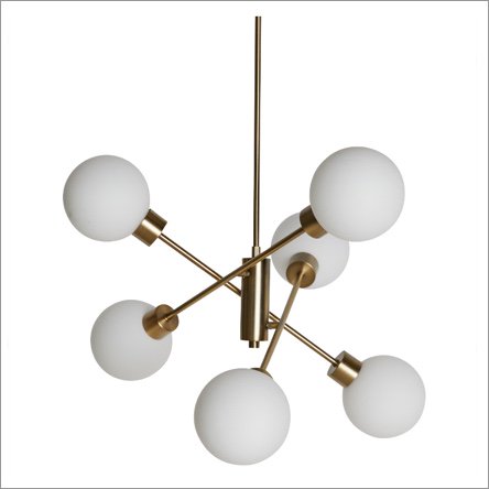 A MoDRN sputnik chandelier in gold. Links to where to shop the best chandeliers. 